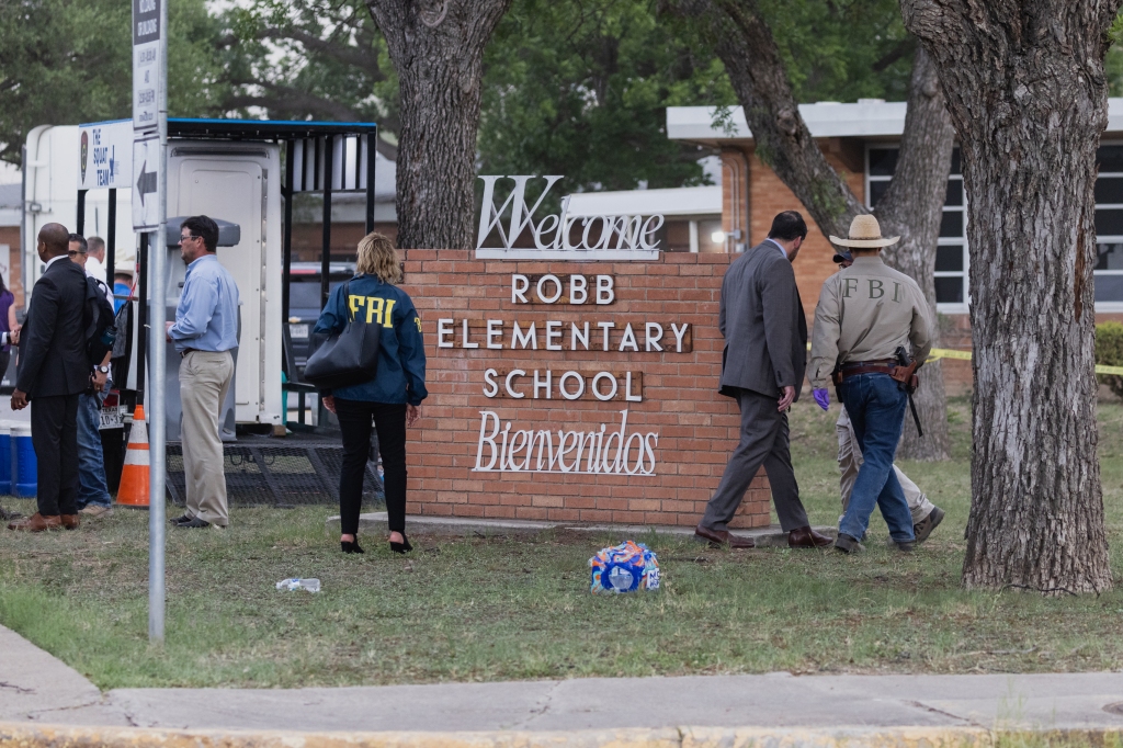 Law enforcement work the scene after the mass shooting at Robb Elementary School where 19 people were killed on May 24, 2022 in Uvalde.