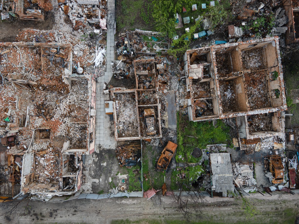 An aerial view shows destroyed houses on May 26, 2022 in Novoselivka, Ukraine.