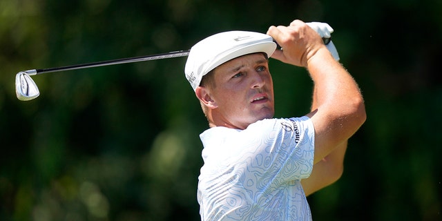 Bryson DeChambeau hits from the second tee during the third round of the Tour Championship golf tournament Saturday, Sept. 4, 2021, at East Lake Golf Club in Atlanta.