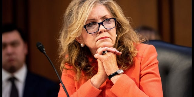 Sen. Marsha Blackburn, R-Tenn., listens to senators' opening statements during the confirmation hearing for Judge Ketanji Brown Jackson, President Biden's nominee for associate justice on the Supreme Court, March 21, 2022.