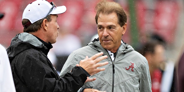 Head Coach Jimbo Fisher of the Texas A&amp;M Aggies talks at midfield with Head Coach Nick Saban of the Alabama Crimson Tide at Bryant-Denny Stadium on September 22, 2018 in Tuscaloosa, Alabama.  The Crimson Tide defeated the Aggies 45-23.