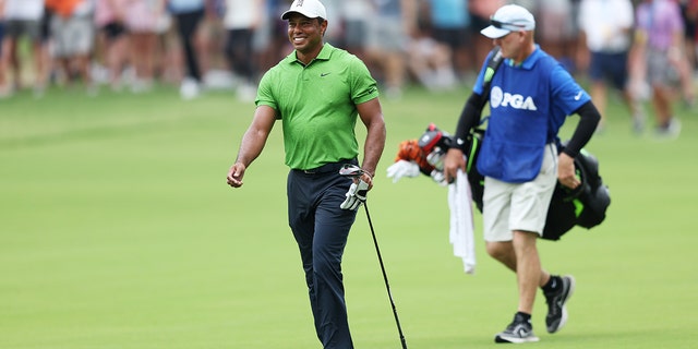 TULSA, OKLAHOMA - MAY 20: Tiger Woods of the United States  walks along the 13th hole during the second round of the 2022 PGA Championship at Southern Hills Country Club on May 20, 2022.