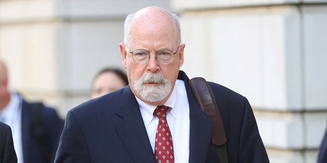 Special Counsel John Durham departs the U.S. Federal Courthouse in Washington, May 17, 2022, after opening arguments in the trial of Michael Sussmann, who is charged with lying to the FBI.