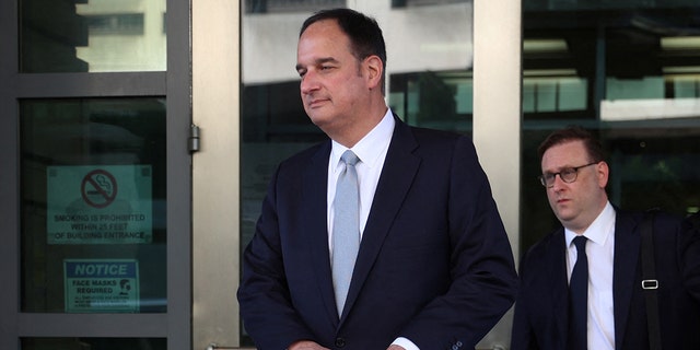 Michael Sussmann departs the U.S. Federal Courthouse after opening arguments in his trial in Washington.