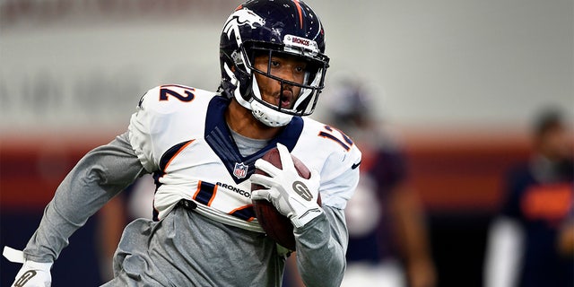 Denver Broncos wide receiver Brendan Langley runs with the ball during training camp on July 29, 2019, in Englewood, Colorado.