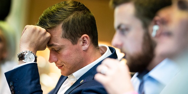 Rep. Madison Cawthorn, R-N.C., watches results from the North Carolina primary election with staff, volunteers, family and friends at his campaign headquarters on Tuesday, May 17, 2022, in Hendersonville, N.C. 