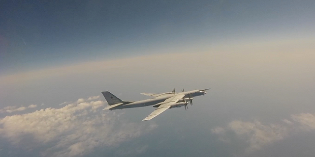 A Russian Tu-95 strategic bomber flies during Russian-Chinese military aerial exercises to patrol the Asia-Pacific region at an unidentified location Tuesday, May 24, 2022.