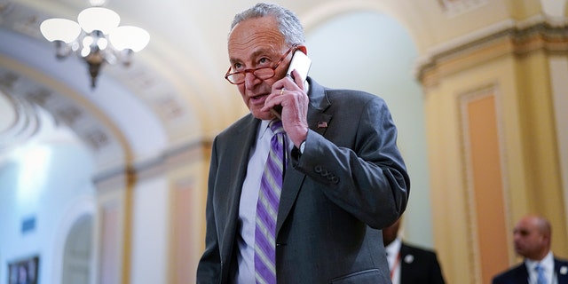 Senate Majority Leader Chuck Schumer, D-N.Y., arrives for a weekly policy luncheon at the Capitol in Washington March 8, 2022.