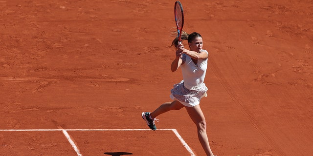 Camila Giorgi of Italy is seen in action against Daria Kasatkina of Russia during day nine of the French Open at Roland Garros on May 30, 2022 in Paris, France. 