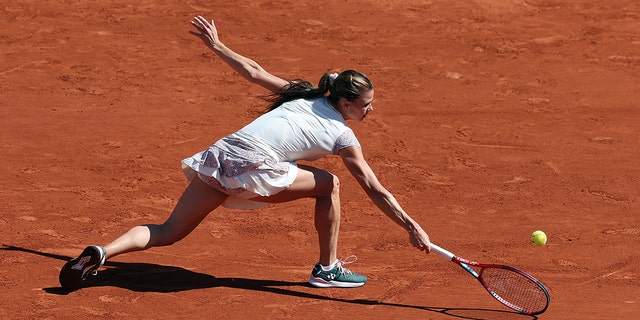 Camila Giorgi of Italy is seen in action against Daria Kasatkina of Russia during day nine of the French Open at Roland Garros on May 30, 2022 in Paris, France. 