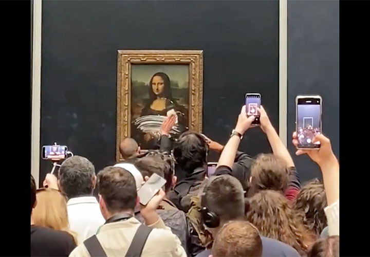 Mona Lisa left unharmed after apparent climate protest stunt