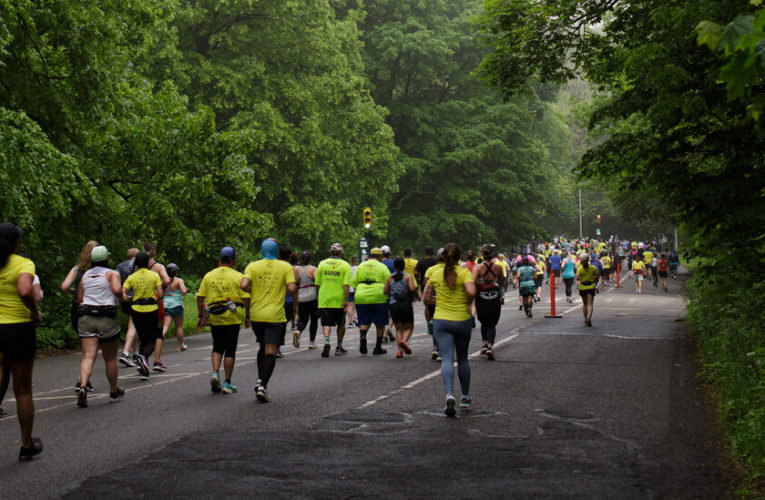 A runner died in the Brooklyn Half Marathon, where organizers had warned of heat concerns.