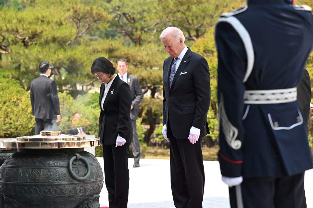 Joe Biden participates in a ceremony in honor of those who died in the Korean War at the National Cemetery in Seoul on May 21, 2022. 