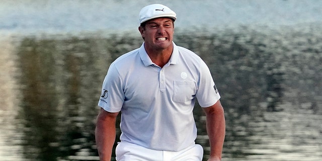 Bryson DeChambeau celebrates after sinking a putt to win the Arnold Palmer Invitational golf tournament Sunday, March 7, 2021, in Orlando, Fla.