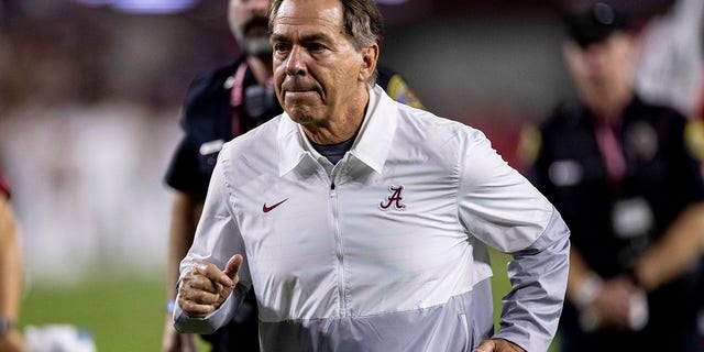 Alabama head coach Nick Saban jogs off the field after the Southern Mississippi game, Sept. 25, 2021, in Tuscaloosa.