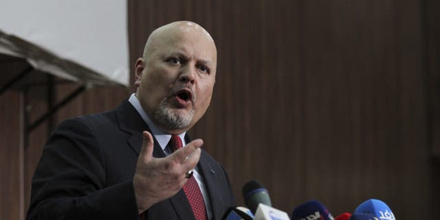 FILE - Karim Ahmed Khan, International Criminal Court chief prosecutor, speaks during a news conference at the Ministry of Justice in the Khartoum, Sudan, Aug. 12, 2021. 