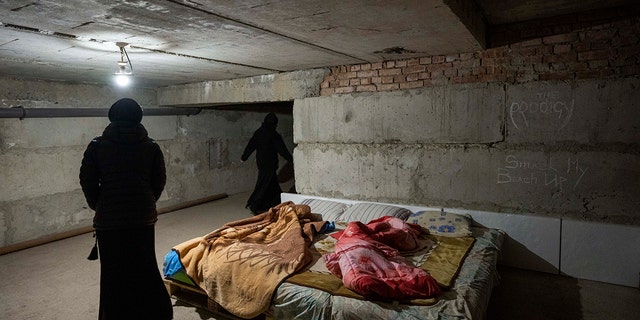 Nuns preparing to take shelter from air raids at the Hoshiv Women Monastery in Ukraine's Ivano-Frankivsk region April 6.