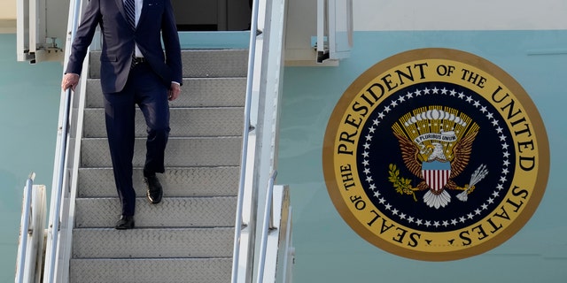 U.S. President Joe Biden, disembarks from Air Force One on his arrival at Osan Air Base in Pyeongtaek, South Korea, Friday, May 20, 2022. (AP Photo/Lee Jin-man, Pool)