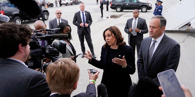 Vice President Kamala Harris speaks with members of the press before boarding Air Force Two at Buffalo Niagara International Airport, Saturday, May 28, 2022, in Buffalo, 