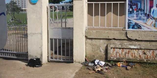 A view of sandles outside Kings Assembly Pentecostal church, following a stampede in Port Harcourt, Nigeria, Saturday, May 28, 2022. 