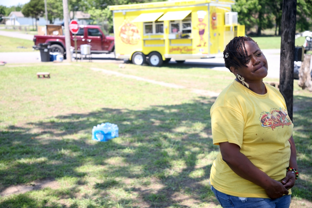 Kountry Queens food truck owner Tiffany Walton talks to media at the scene of a shooting at a Memorial Day