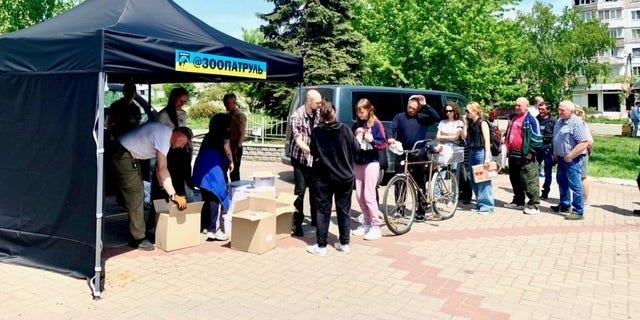 Aid organizations handing out food to the residents of Borodyanka, Ukraine