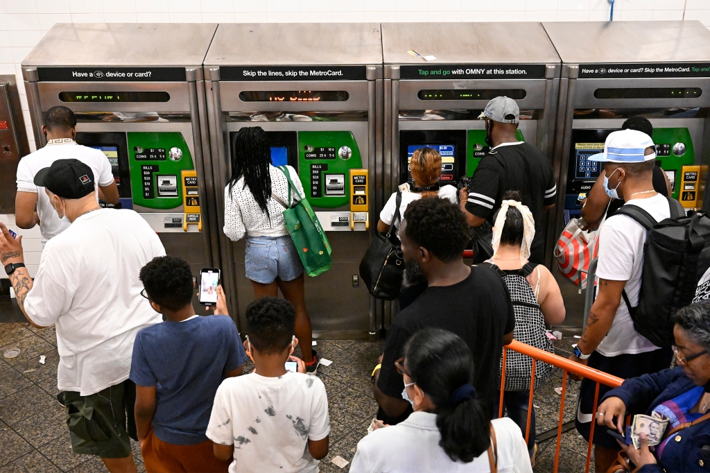 Some fans waited as long as four hours to buy MetroCards with a portrait of the late rapper Biggie Smalls.