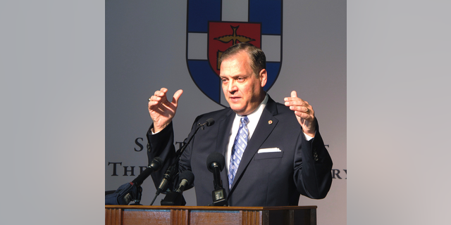 In this Monday, Oct. 5, 2015 file photo, The Rev. R. Albert Mohler Jr., president of Southern Baptist Theological Seminary, speaks to reporters about a conference in Louisville, Ky., focusing on homosexuality and how to offer pastoral care to gays.