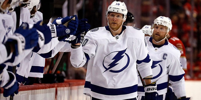 Corey Perry (10) of the Tampa Bay Lightning celebrates his goal with teammates during the first period against the Florida Panthers in Game 2 of the second round of the 2022 Stanley Cup Playoffs at the FLA Live Arena May 19, 2022, in Sunrise, Fla.