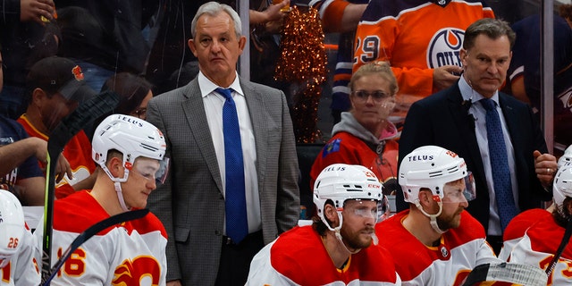 Calgary Flames head coach Darryl Sutter looks on from the bench during the second period of an NHL hockey Stanley Cup second-round playoff series game in Edmonton, Alberta, Sunday, May 22, 2022.