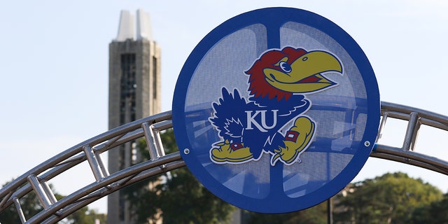 A view of the Kansas Jayhawks logo with the Campanile Bell Tower in the distance before a football game between the Coastal Carolina Chanticleers and Kansas Jayhawks Sept. 7, 2019, at Memorial Stadium in Lawrence, Kan.  