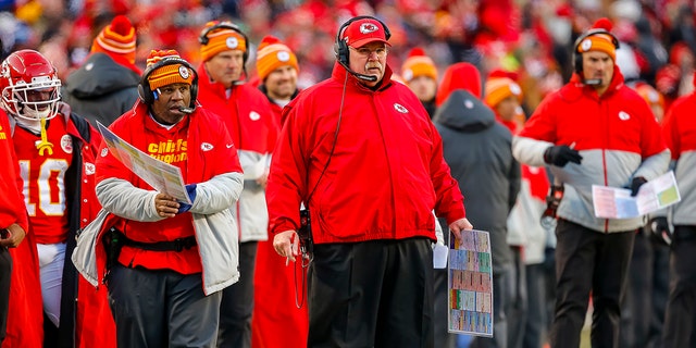 Kansas City Chiefs offensive coordinator Eric Bieniemy watches with head coach Andy Reid of the Kansas City Chiefs during the third quarter of the AFC Championship game against the Tennessee Titans at Arrowhead Stadium Jan. 19, 2020, in Kansas City, Mo. 