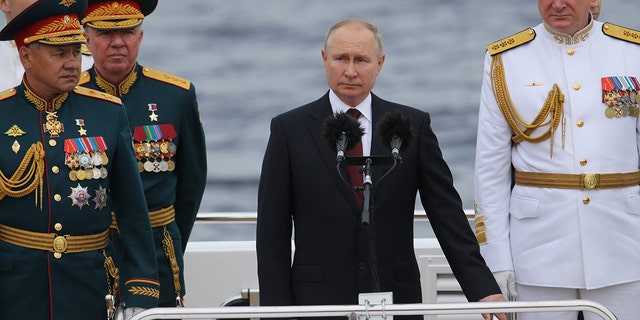 Russian President Vladimir Putin seen aboard of the ship during the military parade marking the Russia's Navy Day, on July,25, 2021, in Saint Petersburg, Russia. 