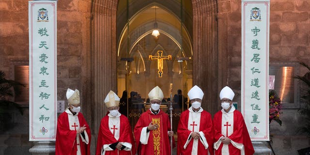 Cardinal Joseph Zen, second from left, joins his colleagues at the Episcopal Ordination of the Most Reverend Stephen Chow in Hong Kong's Cathedral of the Immaculate Conception on Dec. 4, 2021. (Bertha Wang/AFP via Getty Images)