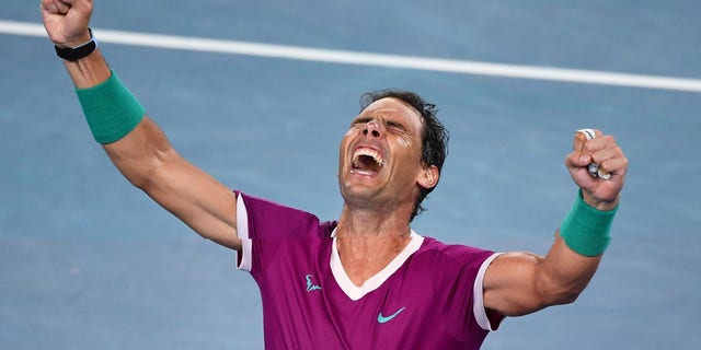 Spain's Rafael Nadal reacts after defeating Russia's Daniil Medvedev during their men's singles final match on day fourteen of the Australian Open tennis tournament in Melbourne Jan. 31, 2022.