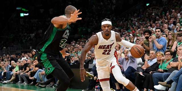 Jimmy Butler (22) of the Miami Heat dribbles during Game 6 of the 2022 NBA Eastern Conference finals against the Boston Celtics May 27, 2022, at the TD Garden in Boston.