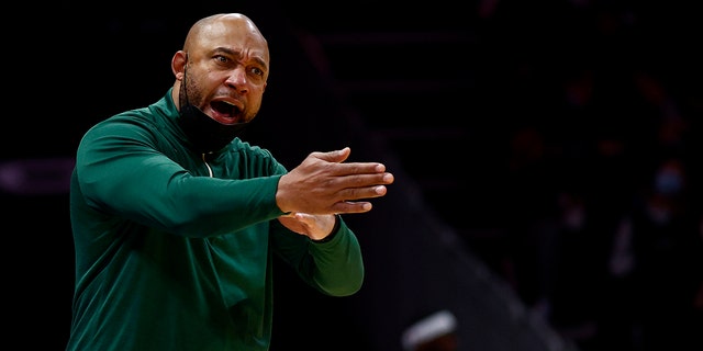 Acting head coach Darvin Ham of the Milwaukee Bucks reacts during the second half of a game against the Charlotte Hornets at Spectrum Center Jan. 8, 2022, in Charlotte, N.C. 