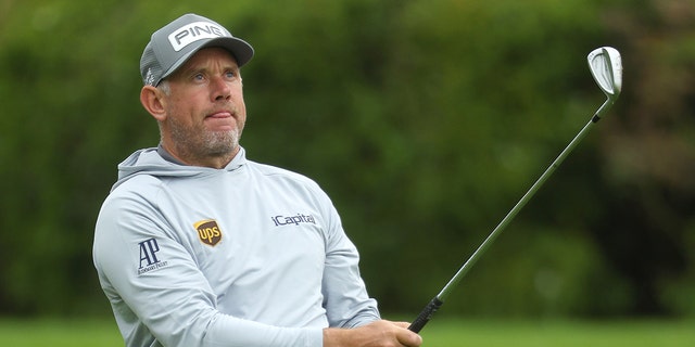 Lee Westwood of England plays his second shot on the 13th hole during the second round of the Betfred British Masters hosted by Danny Willett at The Belfry May 6, 2022, in Sutton Coldfield, England. 