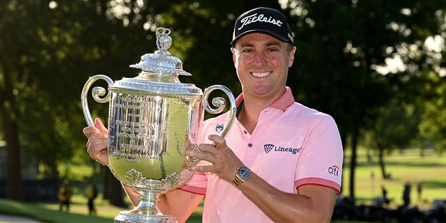 Justin Thomas of the USA celebrates with the Wanamaker Trophy after the final round of the PGA Championship at Southern Hills Country Club on May 22, 2022 in Tulsa, Oklahoma. 