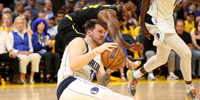 Luka Doncic of the Dallas Mavericks looks to pass the ball during the fourth quarter in Game 5 of the Western Conference Finals on May 26, 2022, in San Francisco.