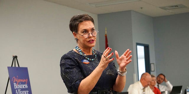 FILE - In this May 16, 2018, file photo, Harriet Hageman addresses a meeting of the Wyoming Business Alliance in Casper, Wyo.  Former President Donald Trump  has chosen Hageman, a favored candidate in his bid to unseat Rep. Liz Cheney, one of his most vocal critics.