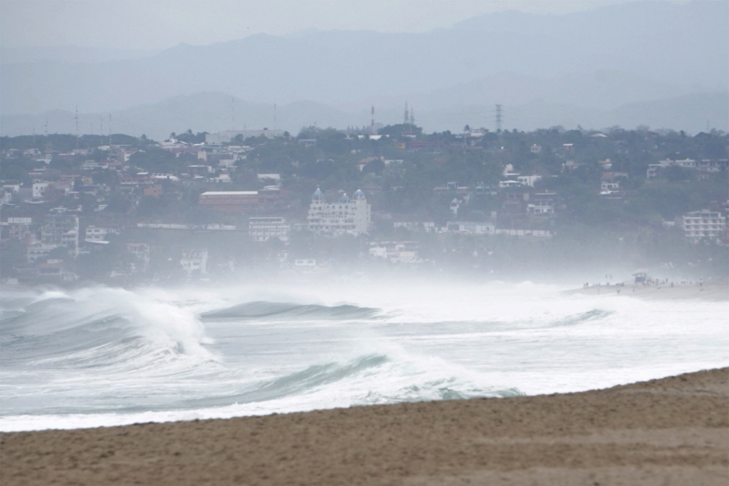 Waves are pictured on a beach as Hurricane Agatha barrels toward the southern coast of Mexico,