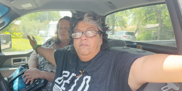 Uvalde, Texas, woman demonstrates how police officers held back Robb Elementary School parents as law enforcement responded to the shooting.