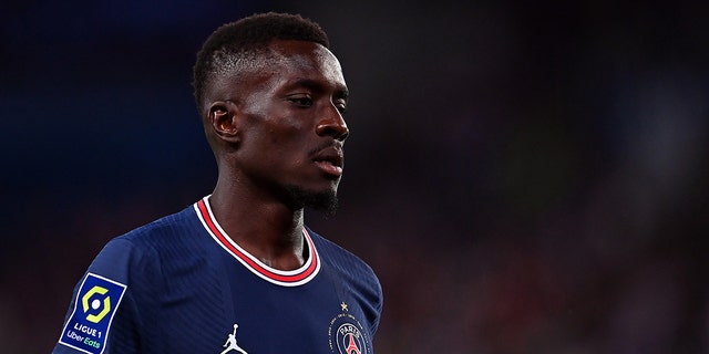 PSG's Idrissa Gueye looks on during the ESTAC Troyes match on May 8, 2022, in Paris.