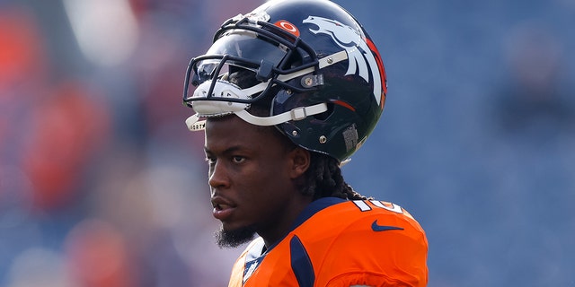 Wide receiver Jerry Jeudy #10 of the Denver Broncos walks on the field before a game against the Los Angeles Chargers at Empower Field at Mile High on November 28, 2021, in Denver, Colorado.