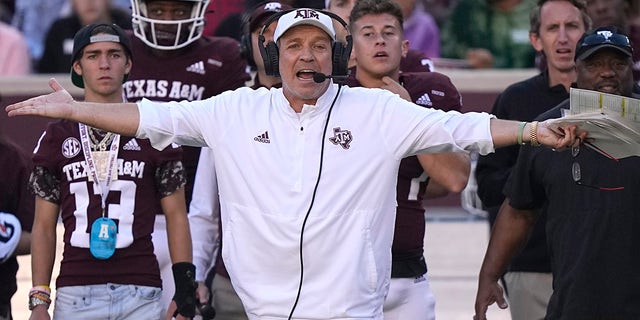 Texas A&amp;M coach Jimbo Fisher yells to the officials during the first half of an NCAA college football game against Auburn Saturday, Nov. 6, 2021, in College Station, Texas.