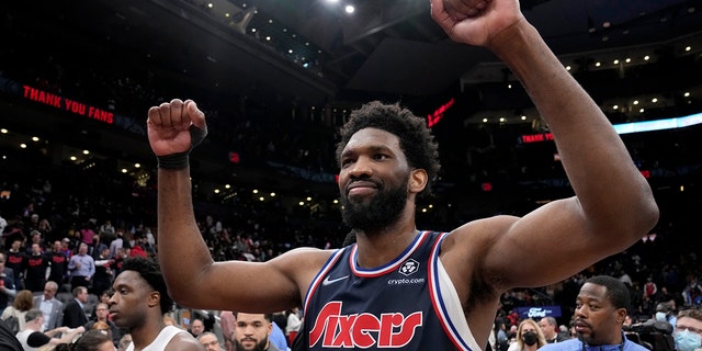 Philadelphia 76ers' Joel Embiid celebrates after Game 6 of the first-round playoff series, April 28, 2022, in Toronto.