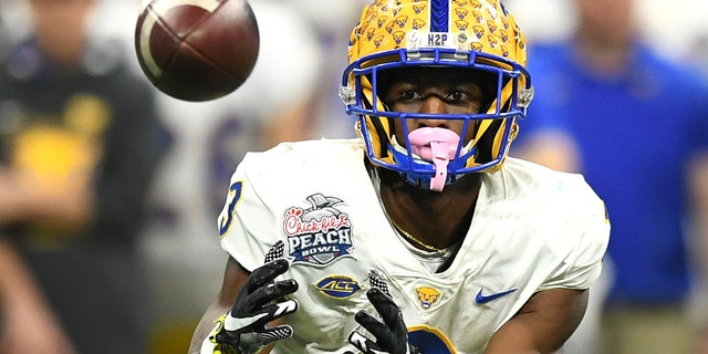 Jordan Addison #3 of the Pittsburgh Panthers makes a catch against the Michigan State Spartans at Mercedes-Benz Stadium on Dec. 30, 2021 in Atlanta, Georgia. 