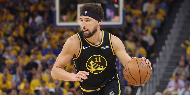 Golden State Warriors guard Klay Thompson drives to the basket against the Dallas Mavericks during the second half of Game 1 of the NBA basketball playoffs Western Conference finals in San Francisco, Wednesday, May 18, 2022.