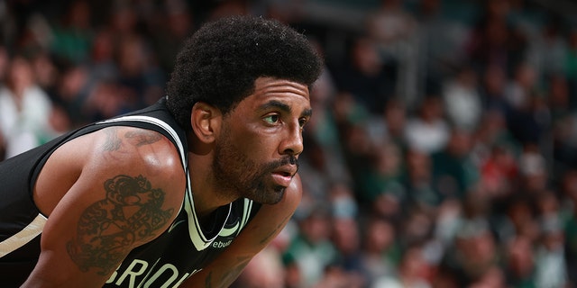 Kyrie Irving #11 of the Brooklyn Nets looks on during the game against the Boston Celtics on March 6, 2022, at the TD Garden in Boston, Massachusetts.